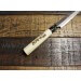 Couteau Takohiki japonais artisanal JIKKO Tokusei lame 24cm Nihon Steel manche magnolia gravé