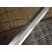 Couteau Takohiki japonais artisanal JIKKO Tokusei lame 24cm Nihon Steel manche magnolia gravé