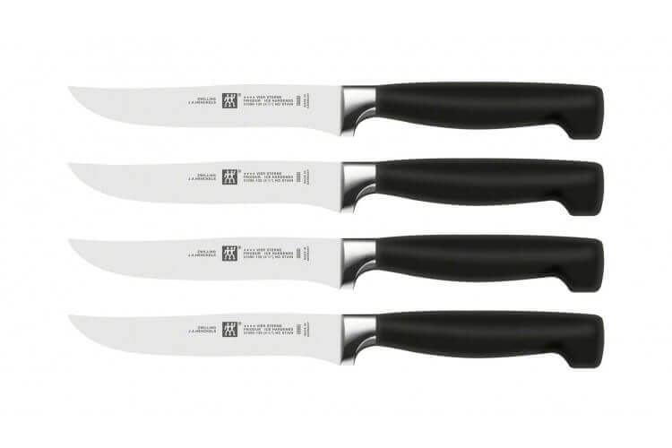Coffret de 4 couteaux à steak lisses Zwilling Four Star lame forgée 12cm