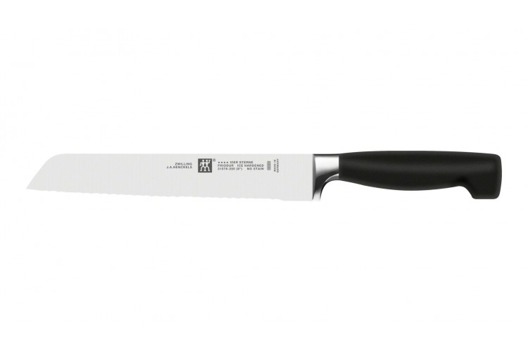 Couteau &agrave; pain Zwilling Four Star lame forg&eacute;e dentel&eacute;e 20cm