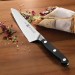 Couteau de chef dentelé Zwilling Pro forgé 14cm