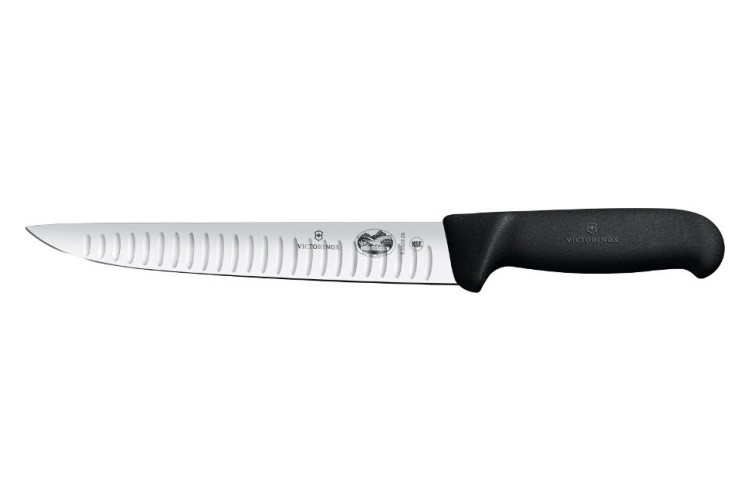 Couteau &agrave; saigner/d&eacute;couper Victorinox Fibrox lame alv&eacute;ol&eacute;e inox