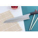 Couteau de chef japonais artisanal martelé Yu Kurosaki Shizuku 24cm acier SG2