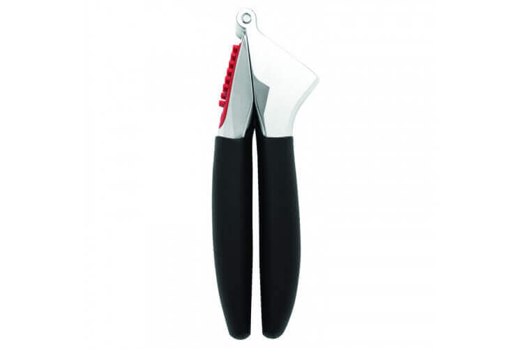 Presse-ail OXO avec brosse à picots intégrée