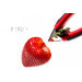 Équeuteur de fraises OXO rouge à pince en inox