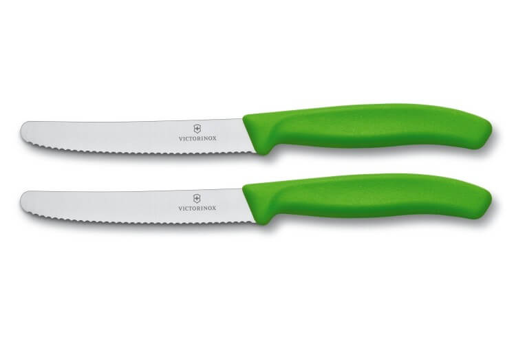 2 couteaux de table Victorinox lame 11cm à dents bout rond manche vert
