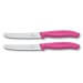 2 couteaux de table Victorinox lame 11cm à dents bout rond manche rose